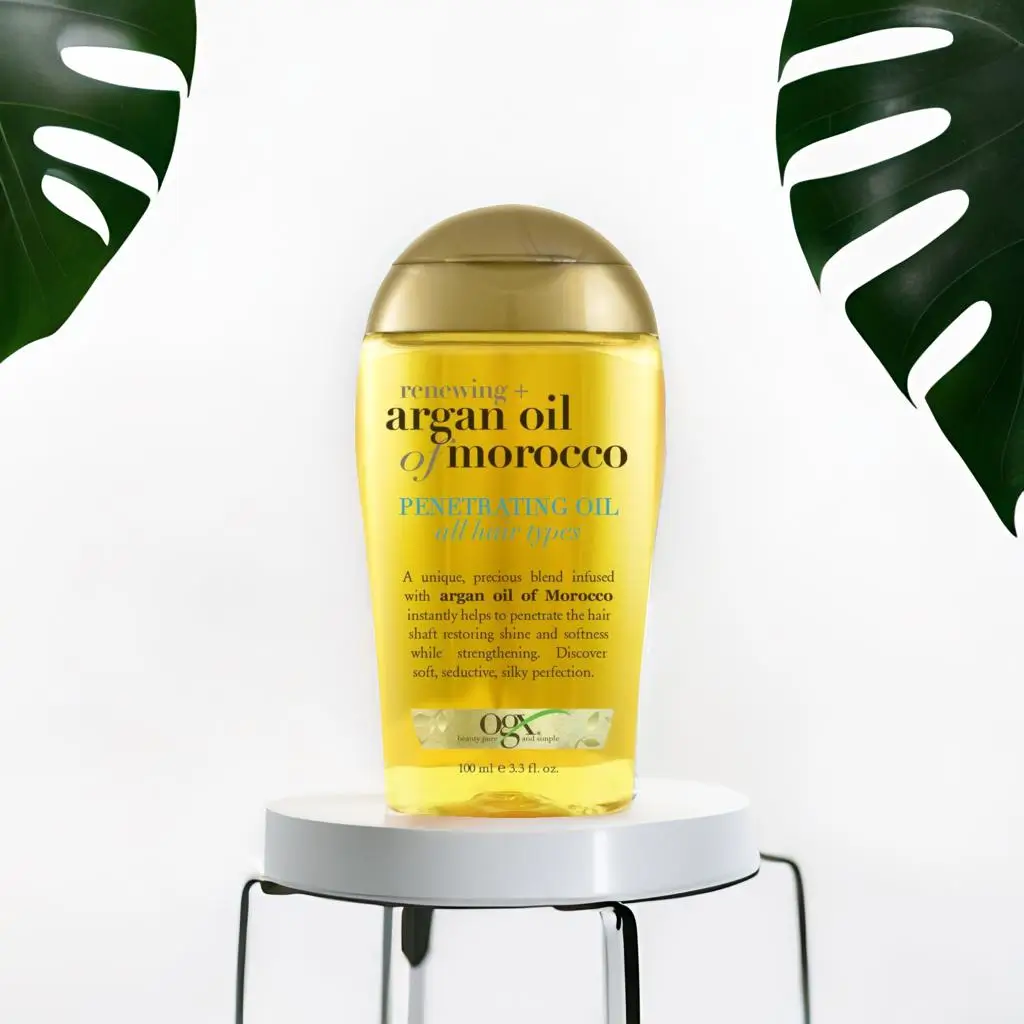 OGX Hair Oil with OGX shampoo and conditioner for smooth, frizz-free hair
Shiny, frizz-free hair after using OGX Hair Oil, ideal hair oil for curly hair