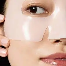 Bio-Collagen Night Wrapping Mask sheet applied on skin overnight
