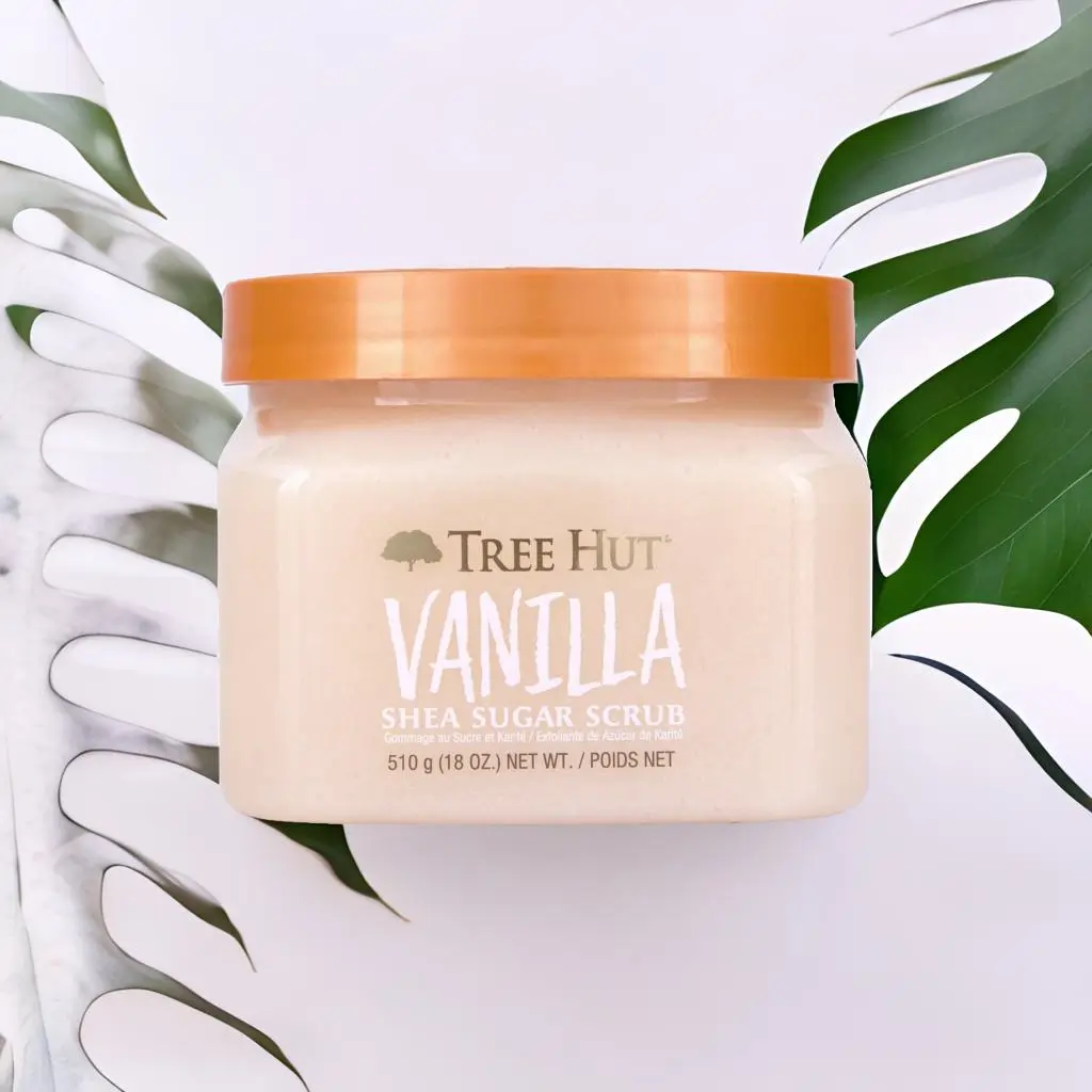 Tree Hut Vanilla Shea Sugar Scrub – natural body scrub with sugar for exfoliation and hydration, paired with Tree Hut body wash, body butter, and shave oil.