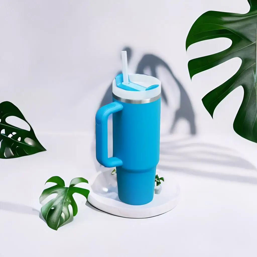 Stanley Flip Straw Tumbler 30 oz in cream color with handle and straw, insulated stainless steel cup for travel and daily hydration